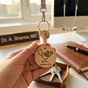 Profession-themed wooden keychains : Doctor