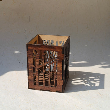 Tea light holder cum pen stand